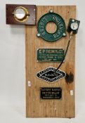 Four cast iron or brass machinery / name plates mounted on a board including ' Lister, Blackstone ',