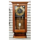 Western Germany mahogany regulator-type wall clock, the black face with brass chapter ring having
