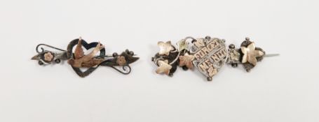Two Victorian silver and gold-coloured bar brooches, one with a swallow and heart motif, the other