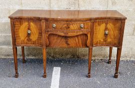 LOT WITHDRAWN Late 19th/early 20th century mahogany sideboard in the Regency manner, of serpentine