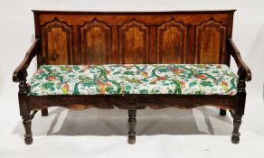 Mahogany and oak five-panel settle with 18th century and later components, the back with arched