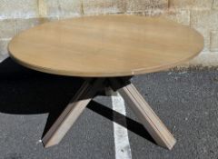 Contemporary limed oak circular dining table on three substantial square splayed legs, signed to