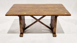 Lacquered wooden coffee table, the two-plank top on eight square supports united by an X-frame,