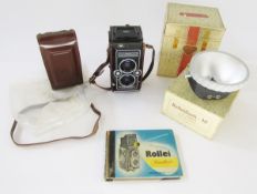 Rollei Magic medium format TLR camera in black, serial no.2502858, in original leather outer