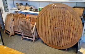 Circular wooden garden table with slatted top and folding base, 147cm diameter and a set of six