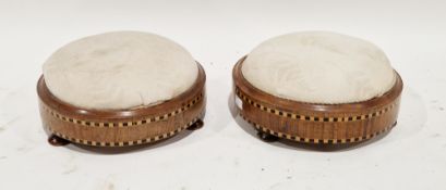 Pair of 19th century mahogany footstools of circular from with ebony and satinwood chequerboard