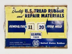 United States Rubber wooden and metal tyre repair perpetual date calendar sign, with two circular