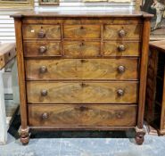 19th century flamed mahogany veneered chest of drawers comprising three short deep and three long