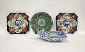 Early 20th century Japanese porcelain blue and white model of a boat, painted with birds above