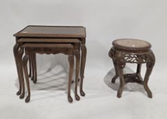 Chinese hardwood jardiniere stand, the circular top inlaid with a marble panel, the frieze with