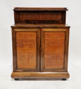 Regency rosewood chiffonier, with two panel doors, on a plinth base, with key (one support missing),