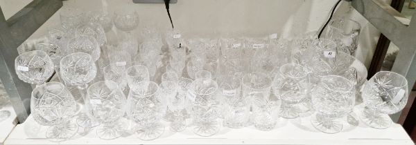 Extensive 20th century cut glass table service, cut with radiating stars, fans and diamonds on