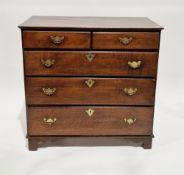 George III oak chest, the rectangular top over two short and three long graduated drawers with
