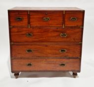 19th century teak and brass-mounted campaign chest of drawers in two sections, the upper section