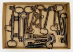 Collection of sixteen antique cast iron keys, 17th century onwards, some being skeleton keys with