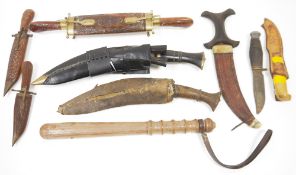 Collection of eight knives including two Kukri knives and Indian carved hardwood cased travelling