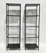 Pair of Ikea Vittsjo shelving units with black finished steel frame, three tinted glass shelves