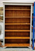 Large modern part painted pine bookcase with five adjustable shelves, reeded side columns, on