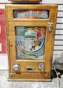 Easy Perm Allwin coin-operated arcade machine manufactured by Oliver Whales, circa 1956, oak