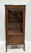 French mahogany and kingwood vitrine in the Louis XV manner, the marble top over a single part