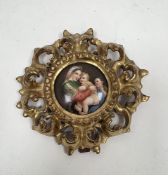Continental porcelain circular plaque within giltwood frame, mid to late 19th century, decorated