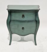 Modern bombe shaped chest of two drawers with a green finish and drop ring handles, 63cm high x 55cm