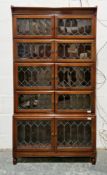 Mahogany glazed five-section bookcase, each section enclosed by a pair of leaded glass doors,