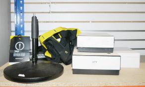 Two K&M stands and Trx suspension trainer straps, two Chanel cardboard boxes and a Dior box