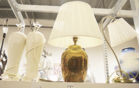 Table lamp with brass baluster shaped base, a pair of ceramic table lamps and one other (4)