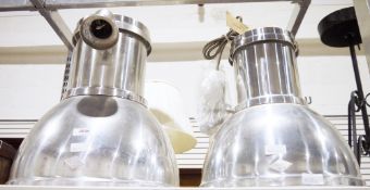 Two contemporary BTC polished aluminium industrial-style pendant lights in sizes, with lozenge-