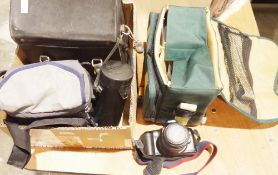 Canon FT 235963 camera with Canon FL 200mm 1-4.5 lens, no.116648, and a Canon EOS 500 camera and