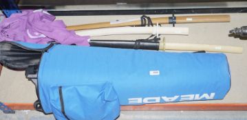 Meade case containing folding tripod and three Japanese bokken-style wooden swords