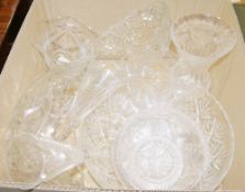 Collection of glassware, including a star cut oval bowl, an engraved footed vase, a press-moulded