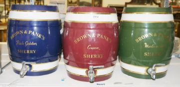 Three Brown & Pank's (Dexham) pottery sherry kegs, one rich golden, one cream and the other medium