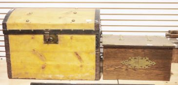 Oak log box of rectangular form with brass mounts, 27cm high x 30cm wide x 52cm long, and a domed