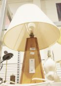 Modern wooden table lamp of steep pyramid form, measuring approximately 32cm high excluding fitting