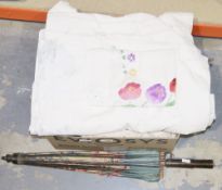 Quantity of textiles including a christening robe, a baby's floral embroidered dress, table linen