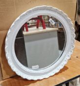 White painted wooden mirror of circular form with foliate moulding, 20cm diameter