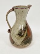 Graeme James (b.1942) a large stoneware studio pottery jug/pitcher of baluster form with waisted