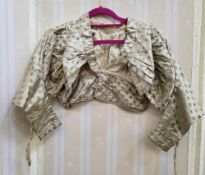 Late 18th century bodice with full leg o'mutton sleeves and peplum, very small