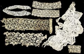 Needlepoint lace collar, stylised flowerhead and scroll decoration, 75cm wide x 35cm deep approx,