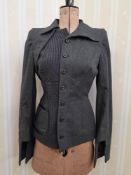 Alexander McQueen grey wool jacket, one side is knitted wool with leather detail, size 38, and