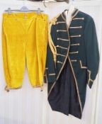 18th century style jacket with brass naval buttons, gold velvet trousers, stockings and bicorn hat.