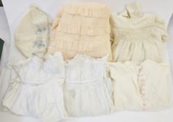 Child's printed organza bridesmaid's dress, white pattern on apricot organza, with a satin belt,