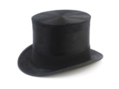 Black silk top hat labelled Horn Bros Limited, Oxford Street, head hole 19.5cm x 15.5cm approx.,
