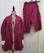 Collection of four theatrical costumes including a red satin jacket with breeches, a little black