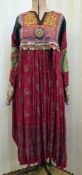 Mid 20th century Afghan dress, full skirt, bodice embroidered with beads, metal discs, beads (one