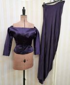 Alexander McQueen purple satin off the shoulder top with a purple satin full-length skirt which is