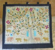 An Indian embroidered bed cover, embroidered with birds, plants in the naif style, 150 x 114cm