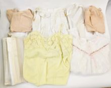 Assorted vintage underwear to include various roll on corsets with suspenders 'Trubenised fused